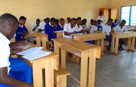 Pupils sitting in classroom