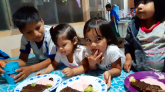 Kids eating something delicious