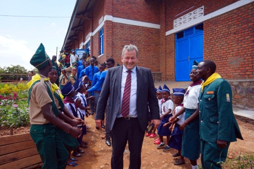 First chairman Gerhard Hermann in front of the new multipurpose hall
